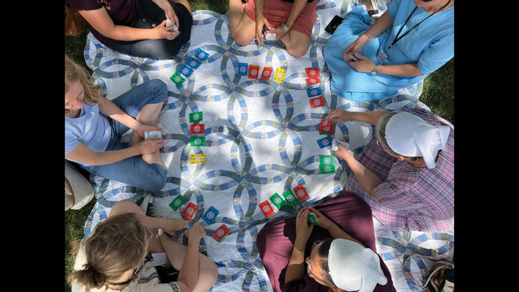 Women play Dutch Blitz during the Smithsonian Folklife Festival in Washington, D.C. — Chris Giannella