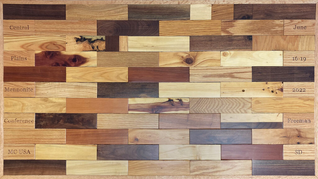The table at the 2023 Central Plains Mennonite Conference annual meeting at York, Neb., assembled from wood blocks congregations brought to the 2022 annual meeting in Freeman, S.D. — Ted Lewis