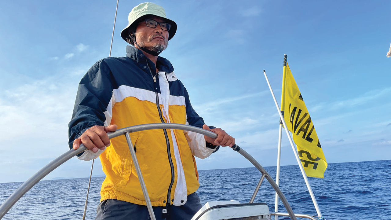 Song Kang-Ho steers Jonah’s Whale June 22 from Nagasaki, Japan, to the island of Kosikijima. The 62-mile leg of the journey took roughly 14 hours to sail. — Project Gongpyeong-hae