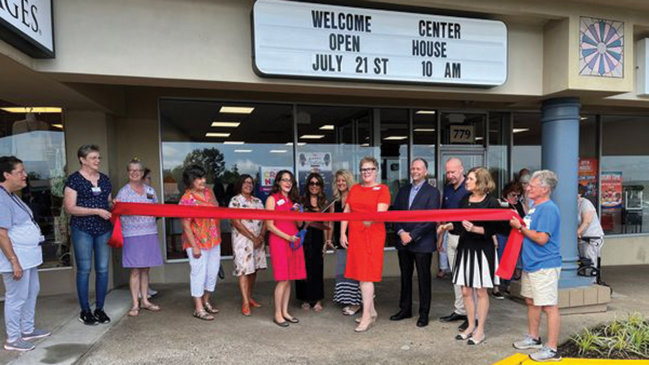 Representatives of Care & Share Thrift Shoppes celebrate the store’s new welcome center July 21 in Souderton, Pa. — Care & Share Thrift Shoppes