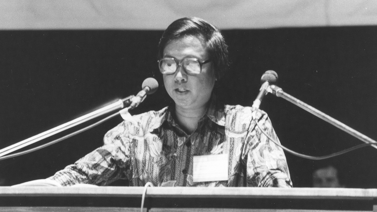 Charles Christano speaks at the 1984 Mennonite World Conference Assembly in Strasbourg, France. — MAID CA CMBS NP149-1-6398