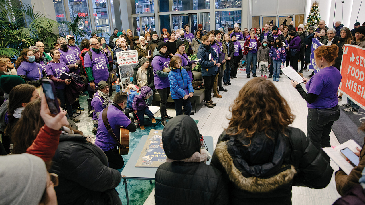 Demonstrators call for a lasting cease-fire in the lobby of the Philadelphia building housing Sen. Bob Casey’s office. — Rachel Warriner/@rayephoto