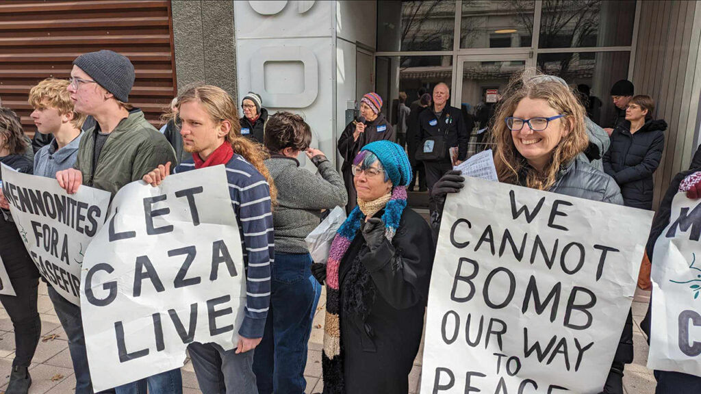 Manhattan Mennonite Church Pastor Melissa Atchison speaks outside Sen. Roger Marshall’s Wichita, Kan., office. — Tim Huber/Anabaptist World