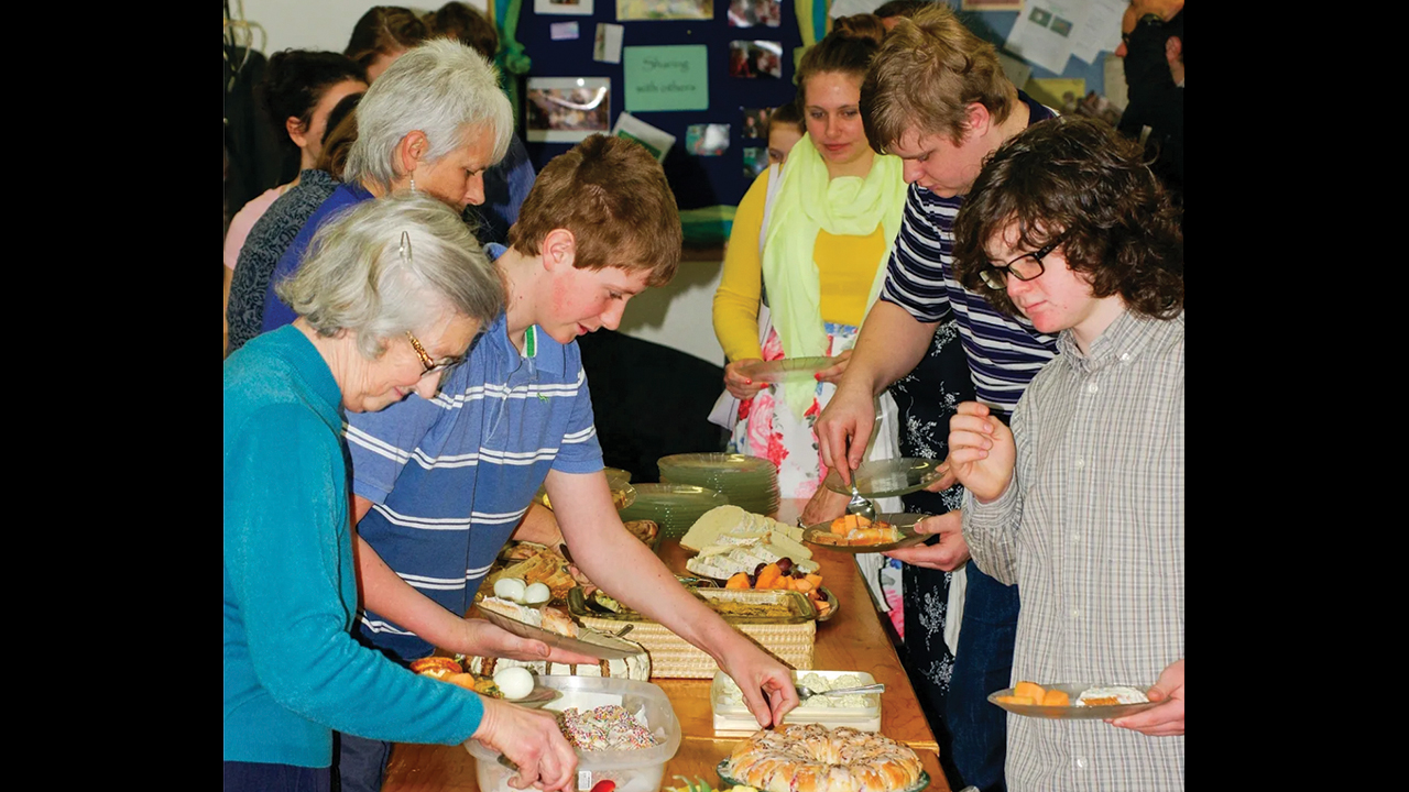Petitcodiac Mennonite Church in New Brunswick shares a meal in its building, which used to be a liquor store. Members of the congregation have volunteered at nearby Dorchester Penitentiary for much of the church’s existence. — Petitcodiac Mennonite Church