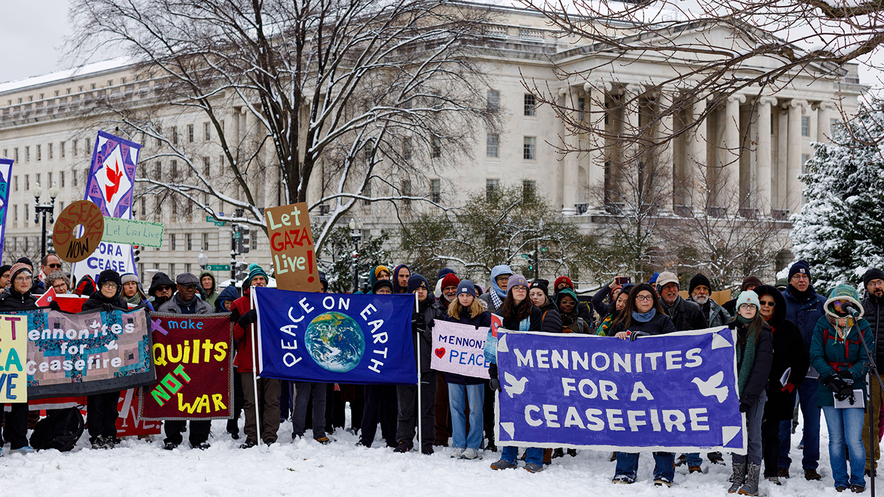 A group of about 200 demonstrators hold a peace service outside the U.S. Capitol and the House of Representatives’ Cannon House Office Building Jan. 16 in Washington, D.C. — Rachel Schrock Photography