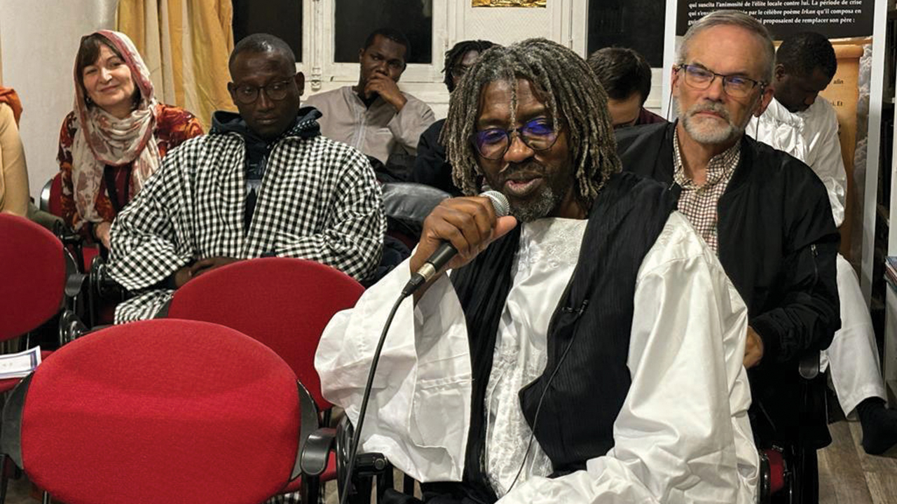 Mame Gora Diop facilitates a session of the Murid-Mennonite encounter. — Jonathan Bornman