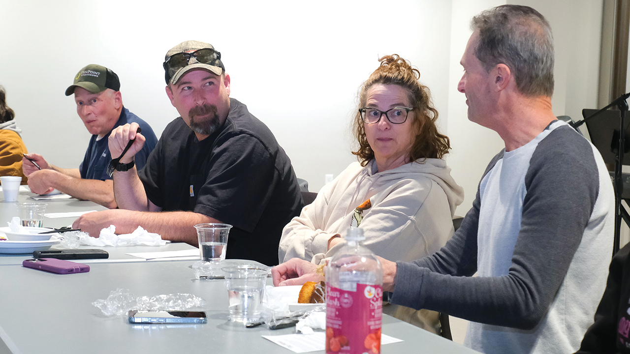 Robert Brody, right, gives input during a Feb. 20 gathering of Motley Church in Lancaster, Pa., as Bob Rupp, left, and Ryan and Stephanie Church listen. — Jonathan Charles for AW