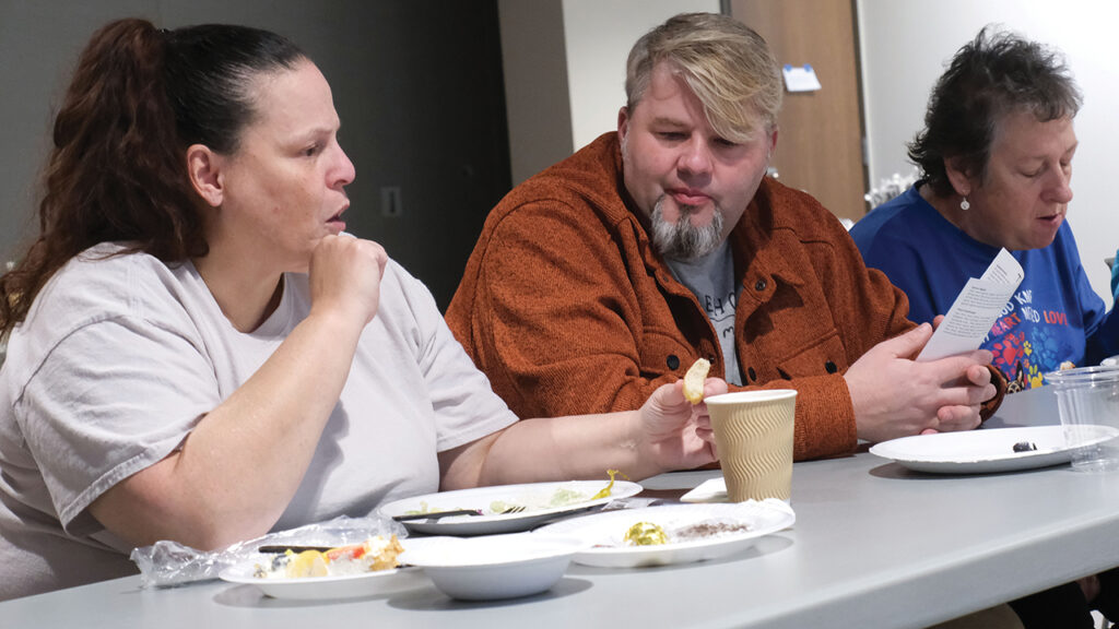 Angie Lopez, left, participates in a discussion at Motley Church with Jared Yoder and Natalie White. — Jonathan Charles for AW