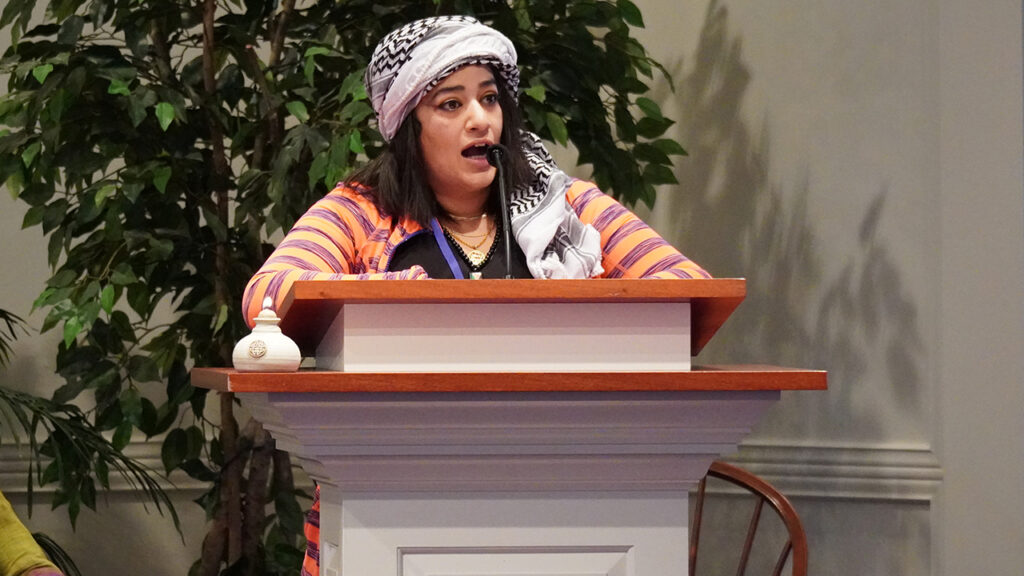 Ahlam Kuttab offers a reflection on American culpability in the Gaza war during a prayer service on March 17. — Randy Martin/Jeremi Tumanan