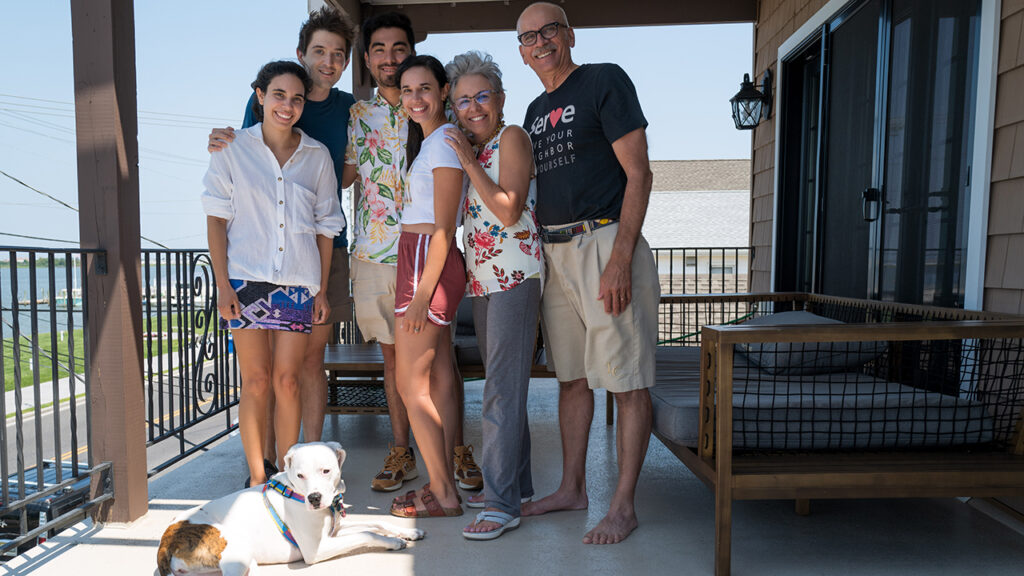 Yentli Soto Albrecht, Sam Riegel, Patrick McDonough, Sara Albrecht Soto, Elizabeth Soto and Frank Albrecht (with Sara and Patrick’s dog Pinot) at the Jersey shore two months after Frank’s ALS diagnosis. — Sam Riegel
