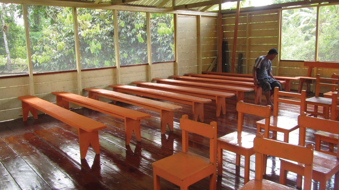 Hiter Yiyoguaje with the benches he made for the village church. — Jerrell Ross Richer/MMN