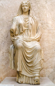 A statue of a typical upper-class Roman woman with her head covered. — Angel M. Felicisimo/Creative Commons