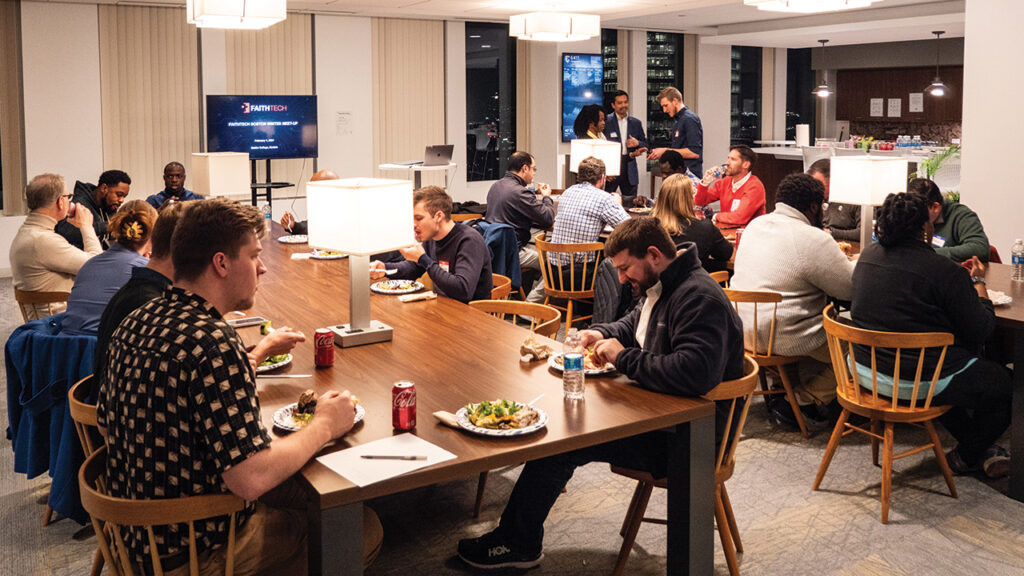 Students gather for Sattler Lunch and Learn, a series that occurs throughout the year. Guest speakers present about different topics. Sattler College is located on the 17th floor of an office building in Boston. — Sattler College