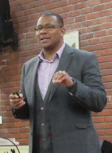 Themba Ndlovu gives a presentation in February at a Brethren in Christ Church United Kingdom leadership symposium hosted by West Midlands BIC Church. — José Arrais