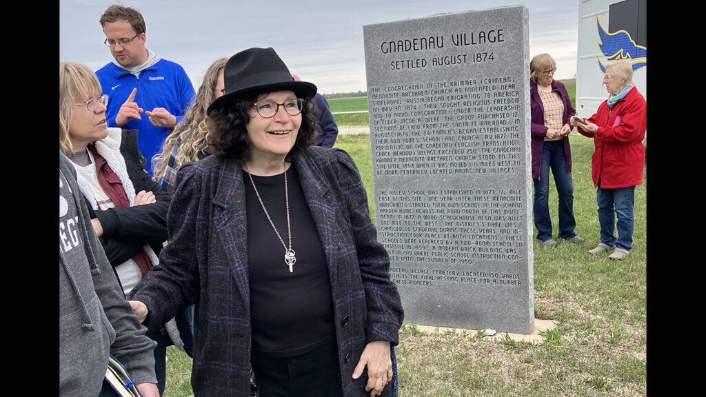 Peggy Goertzen, director of the Center for Mennonite Brethren Studies in Hillsboro, Kan., leads a historical tour at the site of Gnadenau, the first Krimmer Mennonite Brethren village. — Paul Schrag/AW