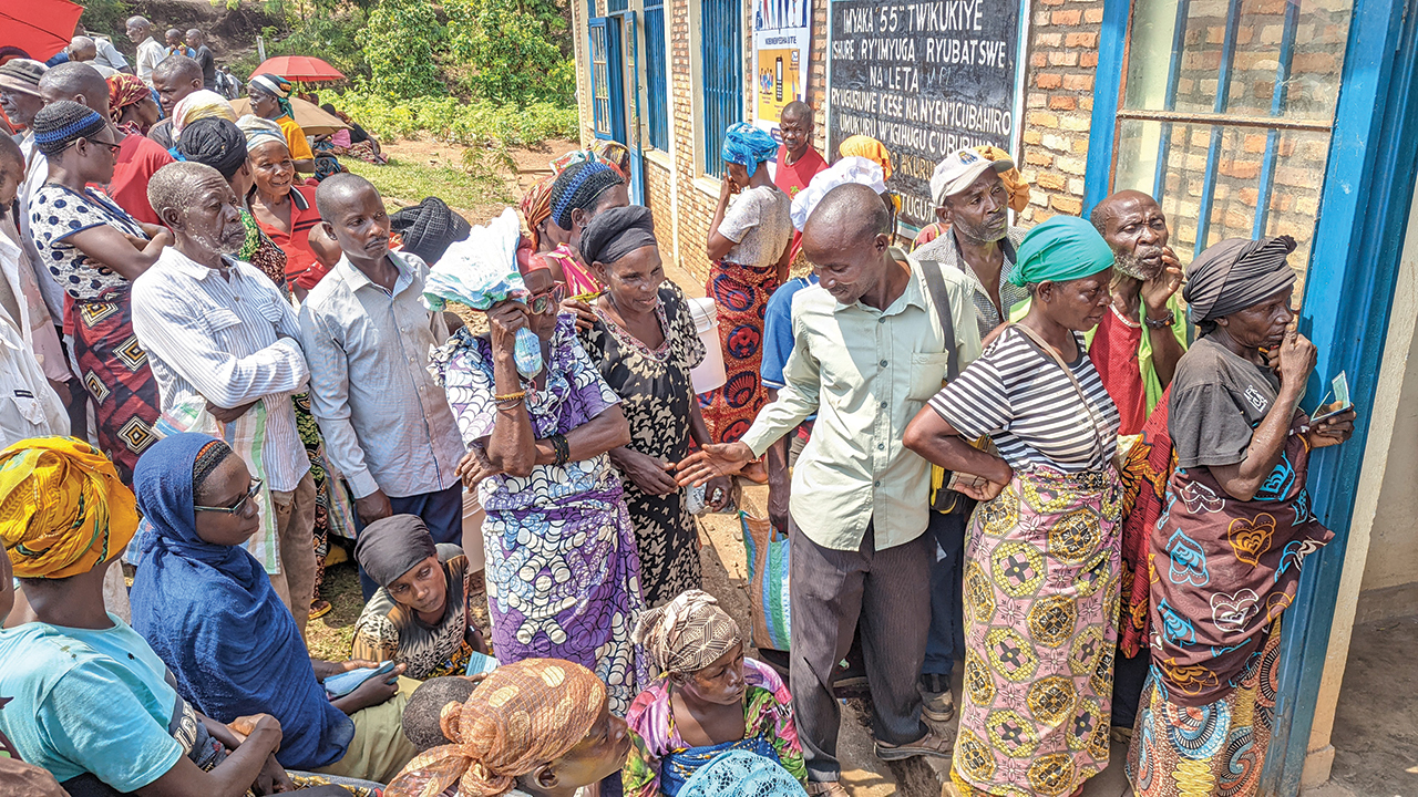 People displaced by floods and landslides in Gitaza, Burundi, line up to register for relief distribution from MCC and its partners. — Mennonite Central Committee