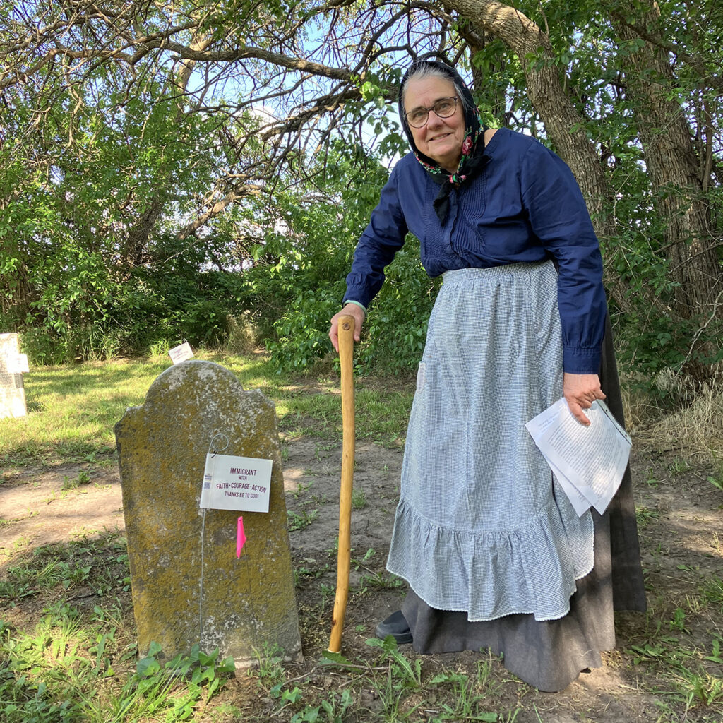 Pat Bartel Penner portrays immigrant Anna Richert Wedel (1811-1890) during a “Talking Tombstones” tour in May at Goessel, Kan. — Paul Schrag/AW