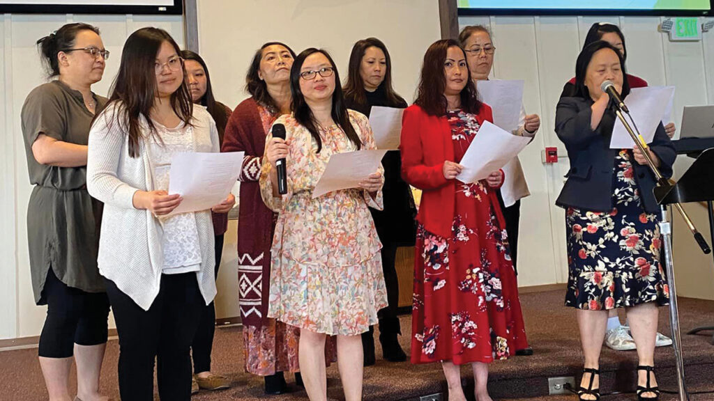 A women’s group offers special music during worship at Rocky Mountain Hmong Mennonite Church, which meets in the sanctuary of Glennon Heights Mennonite Church. — Rocky Mountain Hmong Mennonite Church