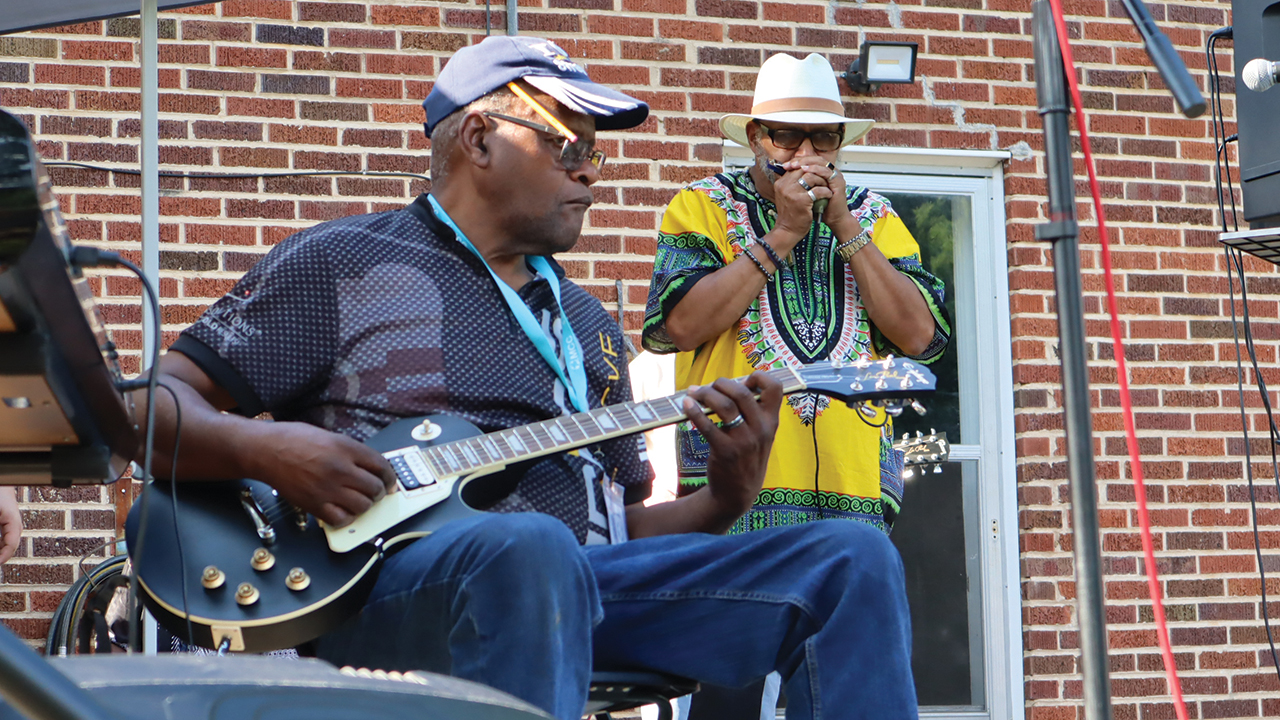 Clyde Ferguson Jr. plays guitar at the “Blues for World Peace and Unity” music festival he organized in Elkin, N.C., to benefit Mennonite Central Committee. — Chris Hon/MCC
