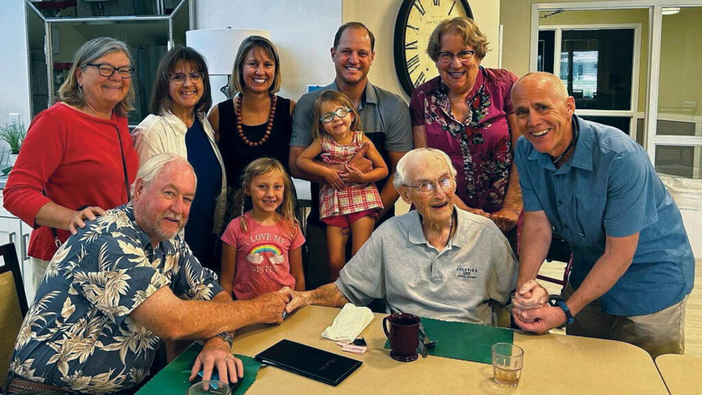 Members of Western Slope Mennonite Fellowship gather with Leo Swartzendruber where he lives at The Fountains, a retirement center in Grand Junction. — Western Slope Mennonite Fellowship