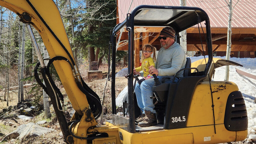Zeph Williams and Emerson Aeschliman of Western Slope Mennonite Fellowship work on building a wheelchair ramp at a Mennonite Disaster Service project at Aspen Camp for the Deaf and Hard of Hearing in Old Snowmass, Colo. — Western Slope Mennonite Fellowship