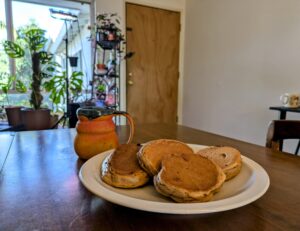 brown pancakes on a white plate