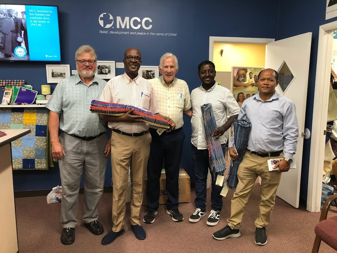 Kenneth Sensenig, Desalegn Abebe, Carl Hansen, Henok Mekonin and Gishu Jebecha visit the MCC Material Resources Center in Ephrata, Pa.