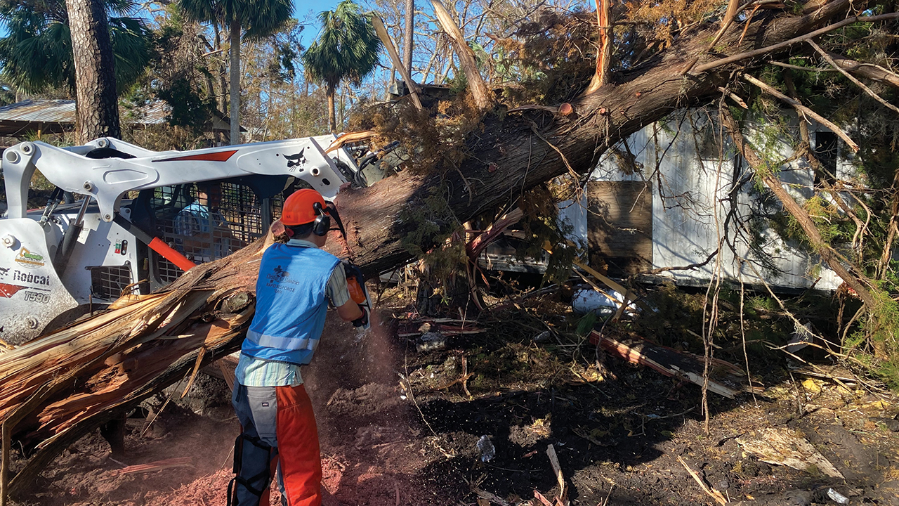 Christian Aid Ministries Rapid Response volunteers clean up debris in Florida following Hurricane Milton. — Christian Aid Ministries