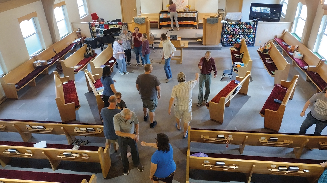 Worshipers greet each other on a Sunday morning at Morgantown Church of the Brethren in West Virginia. — Courtesy of Wes Bergen