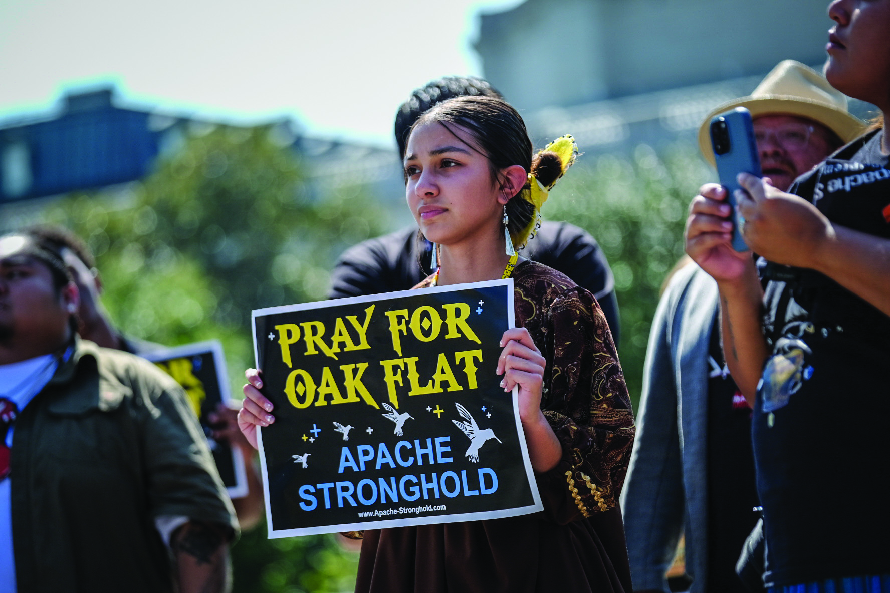 PRAYER FOR THE LAND — Supporters of Apache Stronghold gathered at the Supreme Court on Sept. 11, asking the court to hear an appeal of a ruling that allows copper mining at Oak Flat, land in Arizona sacred to Indigenous people. See page 27. Photo by STEPHEN PAVEY AND BÁÁSÉ PIKE