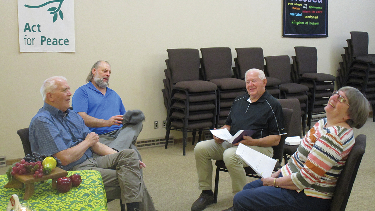 Sermon on the Mount members, from left, Tom Schumacher, Tim Reimer, Jim Ensz and Vicki Biggerstaff discuss the morning's scripture. — Beth Yoder