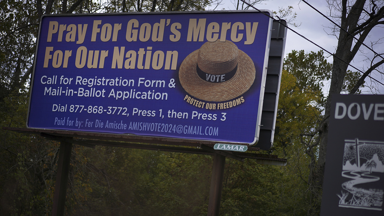 A voting advertisement geared toward the Amish of Lancaster County is displayed Oct. 15 in Strasburg, Pa. — Jessie Wardarski/Associated Press