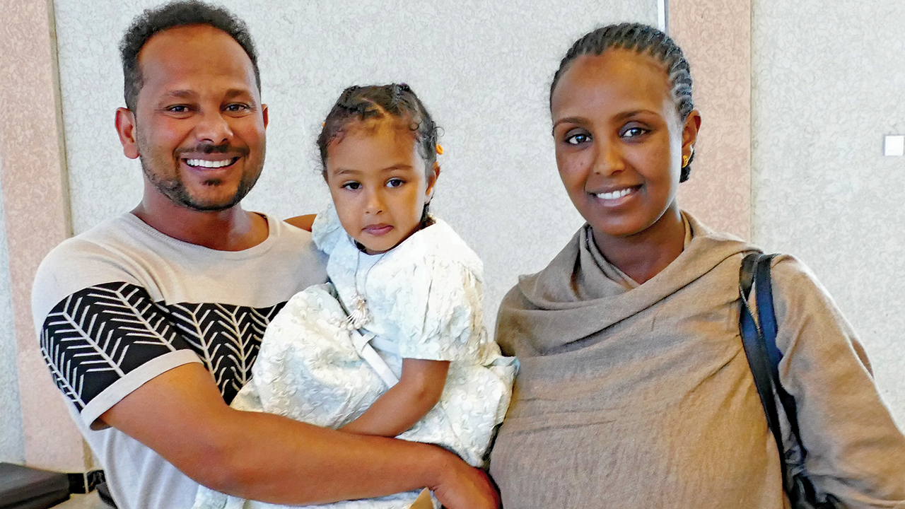 Bizuayehu Abera with daughter Medan and wife Senayt. — Paul Mosley/MCC