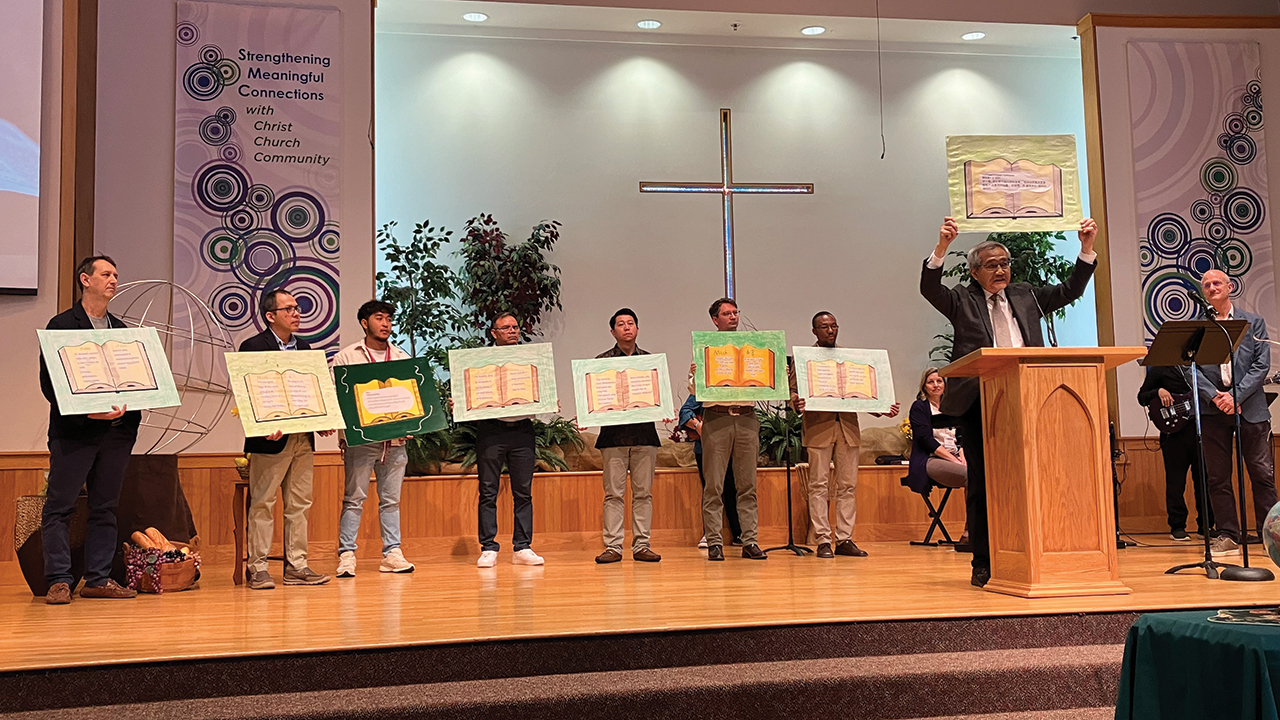 Bernie Cheung, interim pastor at San Francisco Chinese Mennonite Church, recites Micah 6:8 in Cantonese at the Mosaic Mennonite Conference assembly Nov. 2 at Souderton Mennonite Church in Pennsylvania. Worshipers read Micah 6:8 in eight languages. — Paul Schrag/AW