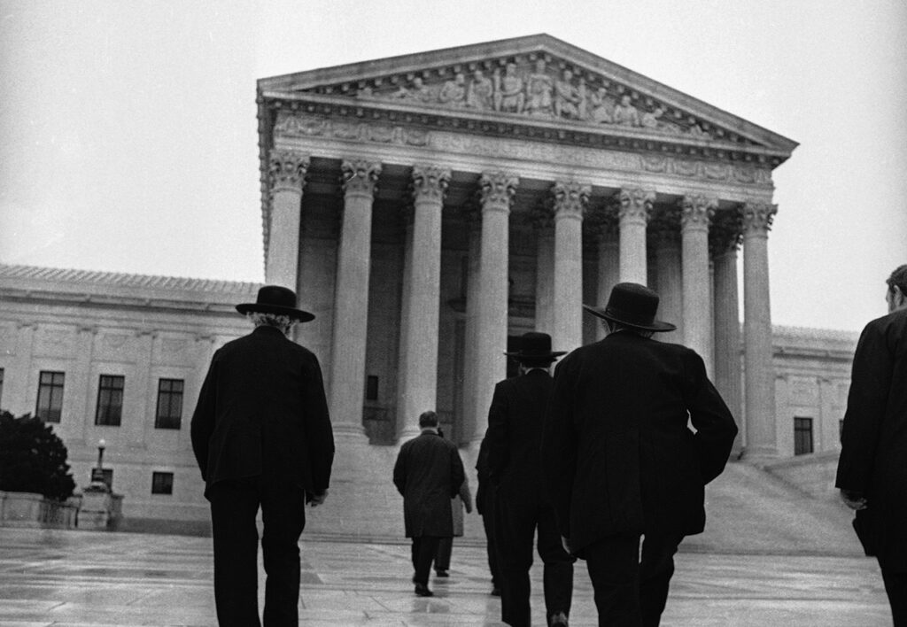 HALLS OF POWER — Amishmen enter the U.S. Supreme Court building to hear debate in the 1972 Wisconsin v. Yoder religious-freedom case that permitted the Amish to end schooling after eighth grade. — Associated Press