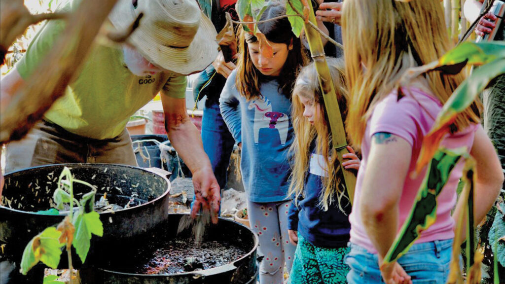 A First Mennonite Church intergenerational Sunday school class field trip to a community garden. — Randy Yee