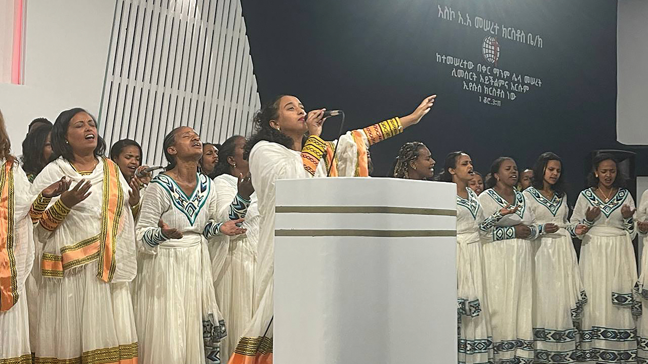 MAKING DISCIPLES — Worship at Asko Meserete Kristos Church, where Tesfagorgis Teklemichael was a pastor. “Mem­bers learned from his perseverance in adversity to serve the Lord and love others as Jesus did,” Ruth Gelane says. — Courtesy of Ruth Gelane