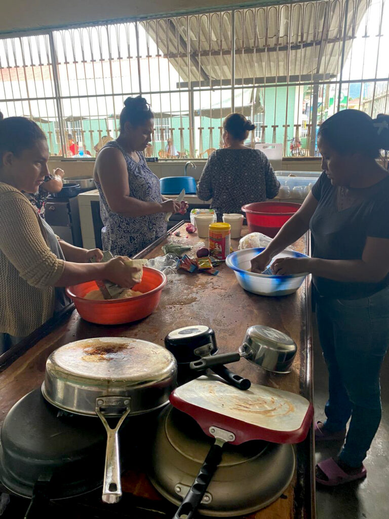 Women from Iglesia Evangélica Menonita de Saba prepare food for people taking shelter and receiving medical care in the church, located in northern Honduras. — Iglesia Evangélica Menonita de Saba