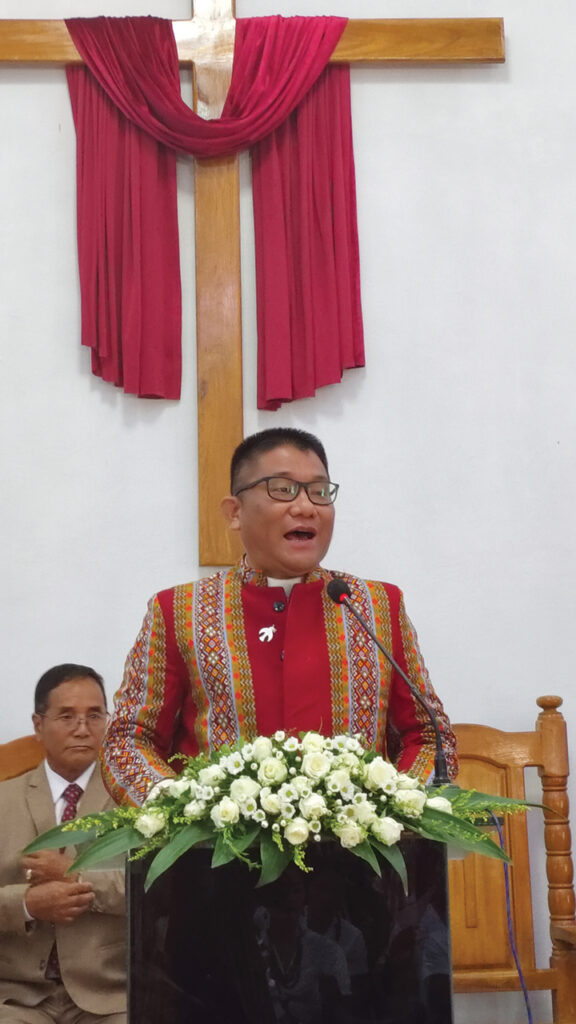 Bible Missionary Church President Amos Chin speaks at the recent dedication of a new church building for the BMC congregation in Sanpya, Myanmar. — Amos Chin/BMC