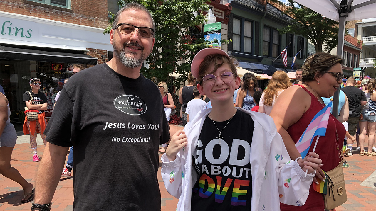 Pastor Chris Scott with “someone we met at Winchester Pride day,” Scott says. “We’ve been a part of Winchester Pride for a couple of years. The first year we were the only church there, at least in a positive way. Every year, people thank us for being there and are grateful for seeing a positive message of Jesus.” — Heather Scott