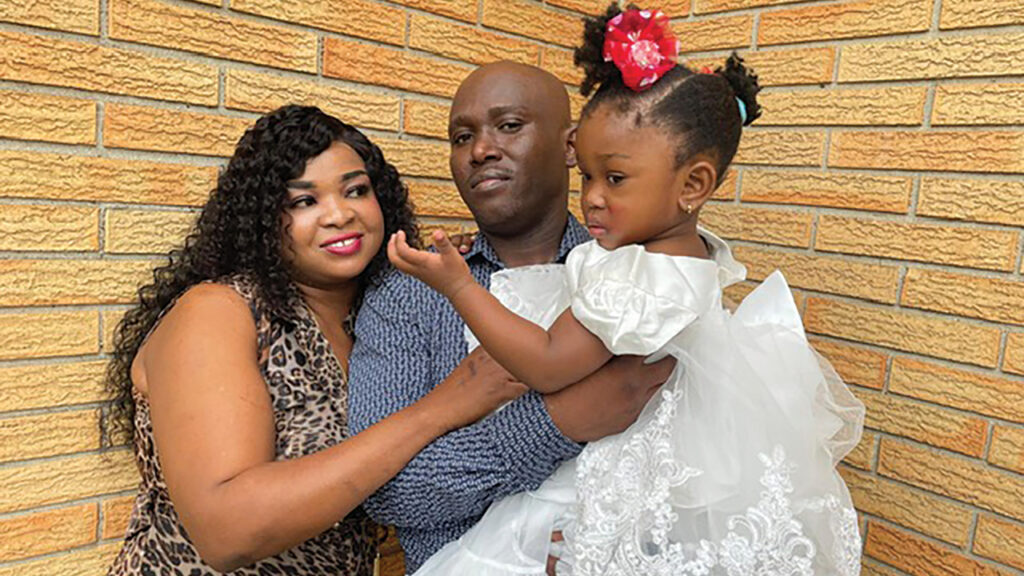 Stannline Jean and Junior Felix with daughter Angelica Stacy Felix at her child dedication service at Lima Mennonite Church. — Jeff Boehr