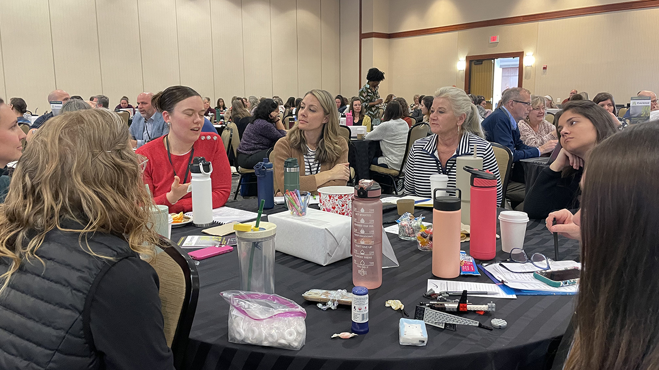 Mennonite Educators Conference attendees converse at the gathering of more than 300 educators and leaders in Mennonite schools and organizations in February in Leesburg, Va. — Mennonite Educators Conference
