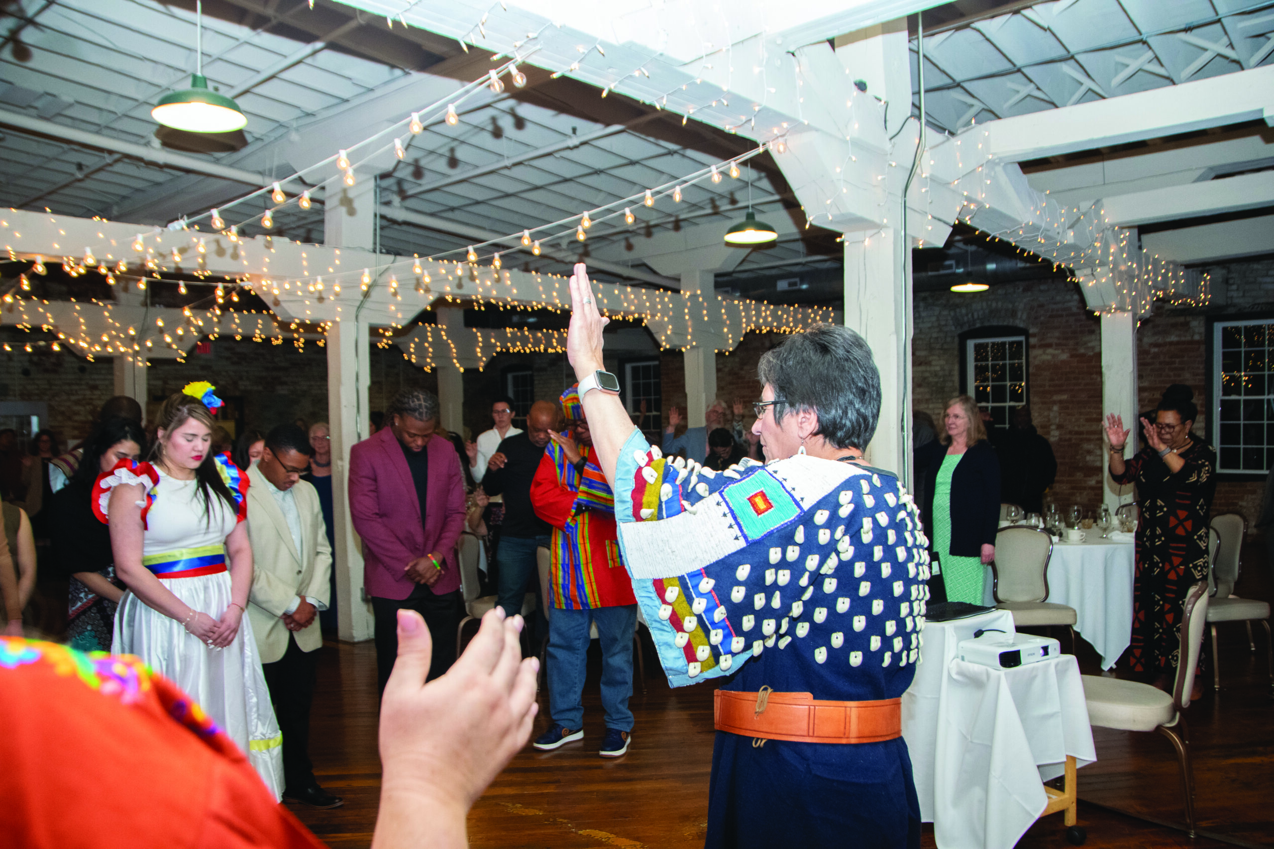 Suzette Shreffler leads a prayer at the Hope for the Future Conference in Goshen, Ind. JUAN MOYA/AW