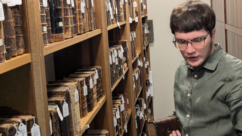 Amish and Mennonite Heritage Center archivist Adam Hershberger speaks about the organization’s Ausbund collection. — Nazareth Project