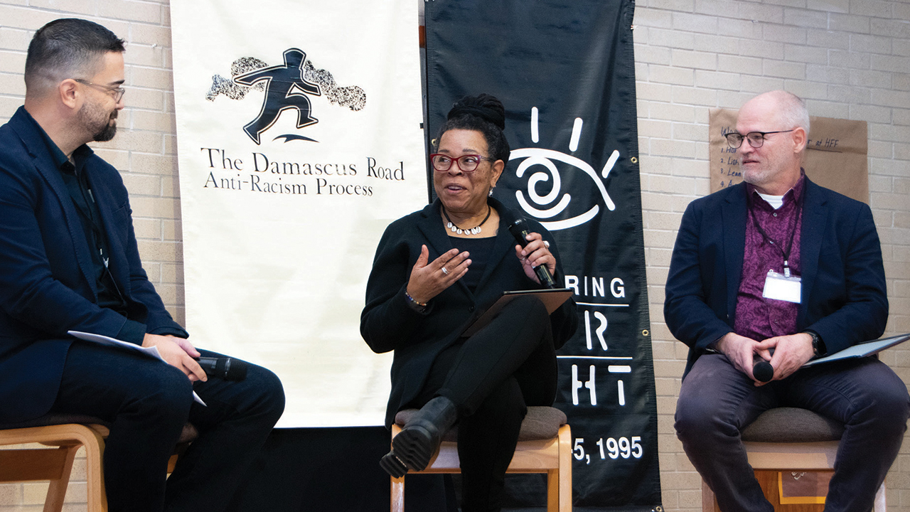 Felipe Hinojosa, left, interviews Regina Shands Stoltzfus and Tobin Miller Shearer, co-founders of the Damascus Road Anti-Racism Process. — Juan Moya/AW