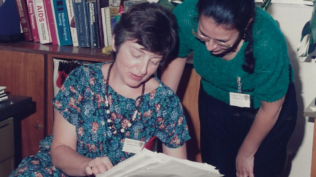 Nancy Martin, left, meets with nursing school assistant director Sawson Shehadeh in 1987. — Nazareth Project