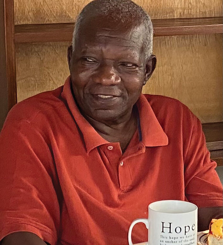Pakisa K. Tshimika enjoys “a daily dose of excellent DR Congolese coffee” in a mug with a message of hope. — Courtesy of Pakisa K. Tshimika
