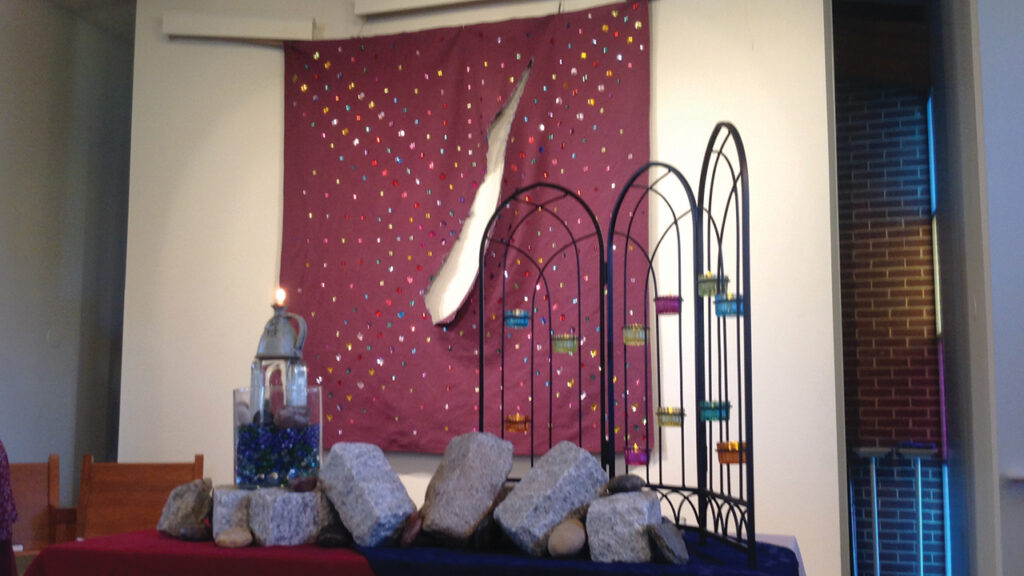 A ripped banner illustrates the deep divide in the United States the Sunday after election day in November at Hyattsville Mennonite Church outside Washington, D.C., in Maryland. — Hyattsville Mennonite Church