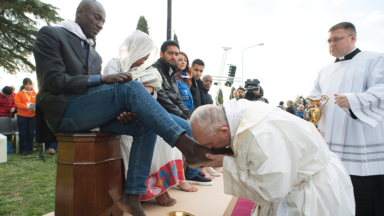 Pope Francis washed and kissed the feet of Muslim, Orthodox, Hindu and Catholic refugees during a footwashing ritual in 2016. — L’Osservatore Romano/AP