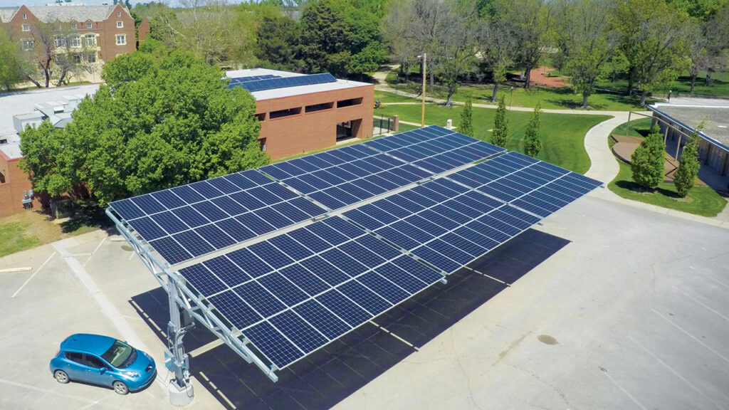 The solar carport at Bethel College added 52.5 kW of solar panels to the 9 kW system on the roof of Schultz Student Center when it was constructed in 2020. It includes two 240-volt electric car charging stations. — Roger Reimer